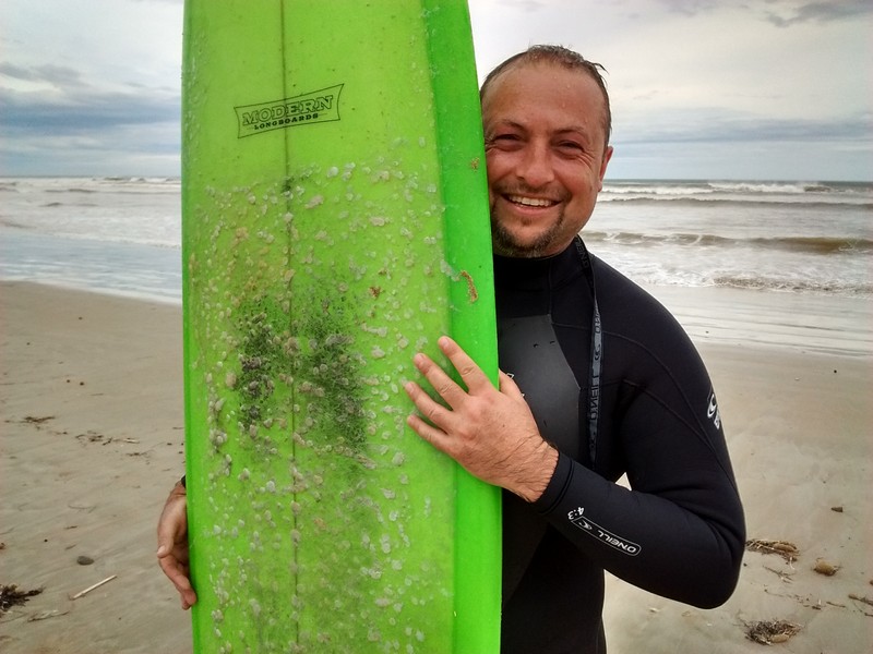 Author Jared Thomas in surf gear at Goolwa Beach, South Australia. (photo: ulrike.ca)
