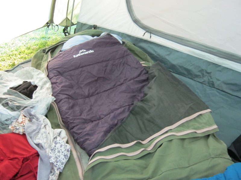 Swag bedroll with a sleeping bag inside, inside a tent in Wirrina, Australia.
