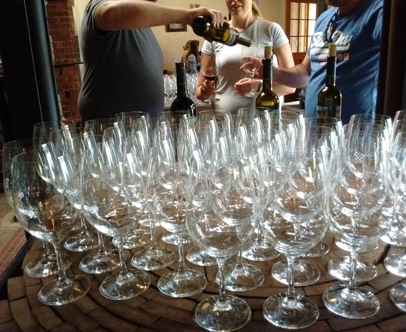 Staff pouring tastings at Samuel's Gorge cellar door and wintery in McLaren Vale area, South Australia.